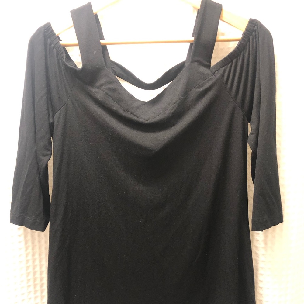Black peek a boo shoulder shirt.